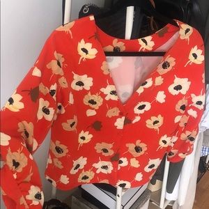 Orange floral blouse